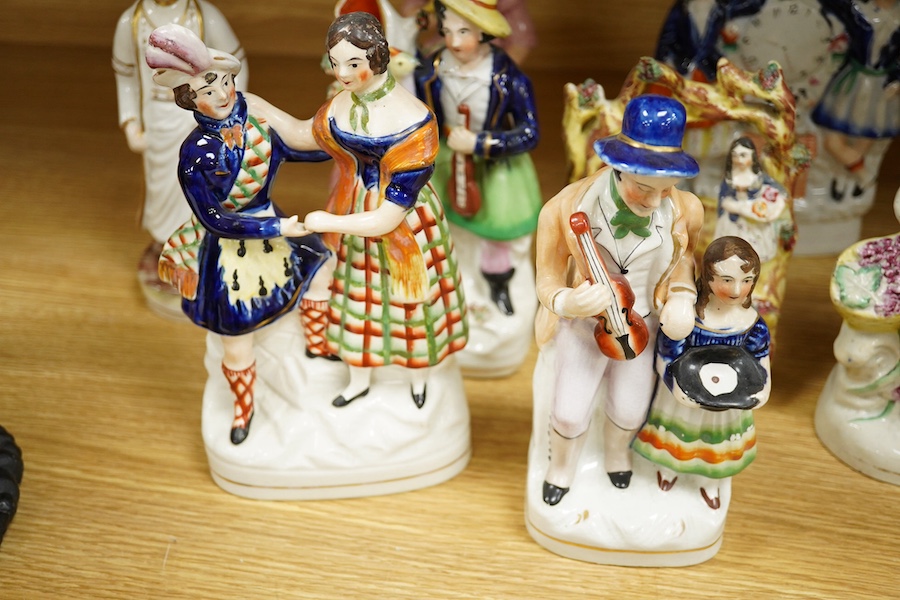 Eleven various Staffordshire figures, tallest 23cm. Condition - varies